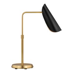 a black and gold desk lamp on a white background