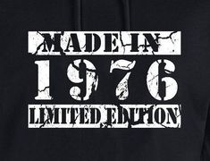 a black hooded sweatshirt with the words made in 1876 limited written on it's chest