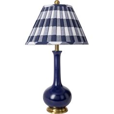 a blue table lamp with a checkered shade