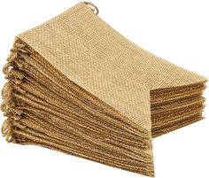 a stack of burlocked jute placemats on a white background