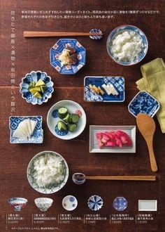 an overhead view of various dishes on a table with chopsticks and utensils