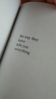 someone is holding an open book with the words, the way they leave tells you everything