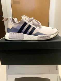 Adidas NMD R1 Orchid Tint (Womens)  Size 7 Orchid Tint/Black EE5176 Thank you for checking my page. A collector and items are 100% guaranteed authentic or your money back. This is a must for die-hard Adidas NMD R1 collectors/sneakerheads. These are NOT FAKES!  These are PRE-OWNED with original box purchased online (Adidas store). Rare colorway.  Please for all customers’ protection, I request my customers to: -Have a confirmed address or be verified by PayPal. -Contact me before buying if you have less than 5 feedbacks.   Shipping -I will box and use packing paper if needed to secure and protect your purchases. -Will use USPS Priority with delivery confirmation. Packed securely to protect your purchased item. Handling cost includes insurance. -Will ONLY ship to a confirmed domestic address Adidas Store, Packing Paper, Adidas Nmd R1, Nmd R1, Adidas Nmd, Die Hard, Sneaker Head, Online Purchase, Athletic Shoes