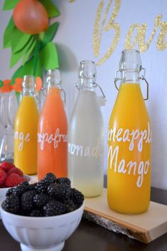 some fruit and drinks are sitting on a table