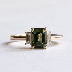 Emerald Gemstone Engagement Ring Gold, Tourmaline And Diamond Ring, Green Engagement Ring And Wedding Band, Wedding Ring With Emerald Accents, Engagement Rings Emerald Cut Three Stone, Green Gem Rings, Green Emerald Cut Engagement Ring, Green Gold Engagement Ring, Emerald Cut Gemstone Ring