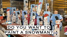 some people are holding up paintings with snowmen on them and the words do you want to paint a snowman?