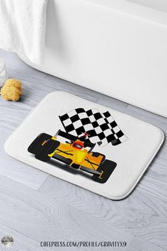 * Yellow Race Car with Checkered Flag Bath Mat | CafePress by #Gravityx9Designs / #Sports4you * VROOM VROOM! This race car bathroom mat / Kitchen rug is a real winner! * Made of plush, water-absorbent microfiber edged with piping * Measurements: 24" w x 17" * Easy Care Machine Washable * * Cushioned memory foam core; nonskid backing * This race car design is on shower curtains, pillows, shirts and more. * 0324 Bath Sets