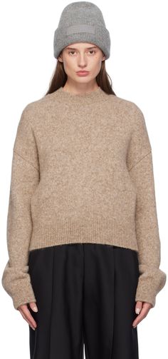 Find JACQUEMUS Brown Les Classiques 'la Maille ' Sweater on Editorialist. Brushed knit alpaca wool-blend sweater. · Rib knit crewneck, hem, and cuffs · Cropped hem · Dropped shoulders · Intarsia logo at back Part of the Les Classiques collection. Supplier color: Beige Knit Alpaca, Knit Crewneck, Alpaca Wool, Wool Blend Sweater, Wool Sweater, Drop Shoulder, Alpaca, Merino Wool, Apparel Accessories