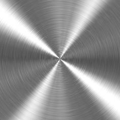 an abstract silver metal background with a circular design in the center and some light at the end