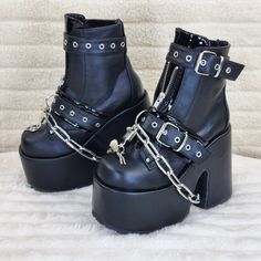 5" (127mm) Chunky Heel, 3" (75mm) Platform Ankle Boots Metal Front Zip Closure Top Buckle Strap W/ Eyelet & Lower Buckle Strap W/ Eyelets, D-Ring & Working Removeable Chrome Metal Plated Padlock With Keys Removeable Thick Metal Chain Draped Through Platform And Heel Channel Brand New Demonia Us Sizes 6-12 Chunky Goth Boots, Edgy Silver Platform Boots, Silver Platform Punk Boots, Halloween Party Platform Boots With Metal Feet, Gothic Platform Boots With Metal Feet For Party, Silver Gothic Boots With Metal Feet, Gothic Silver Boots With Metal Feet, Gothic Silver Boots With Round Toe, Aj Shoes