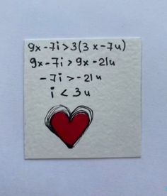 a piece of paper with writing on it and a red heart in the middle,