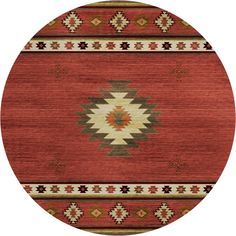 a round rug with an orange and brown design on it's center, in the middle