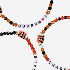 Accessorize and maximize your fandom while impressing your fellow fans with this Joe Burrow & Ja'Marr Chase Cincinnati Bengals 3 Pack Player Friendship Bracelet. These matching friendship bracelets have an all-over team-colored design and team logo displays, which makes them the perfect way to show your support for the Cincinnati Bengals and get in on the latest accessory craze. Every bead bracelet design is the perfect addition to your outfit, whether you’re heading to the game, watching at hom Bengals Crafts, Nfl Bracelets, Joe Shiesty, Nfl Quarterback, Matching Friendship Bracelets, Joe Borrow, Cool Friendship Bracelets, Bengals Football, Diy Travel Journal