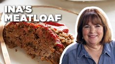 a woman standing next to a piece of meatloaf on a plate with the words ina's meatloaf