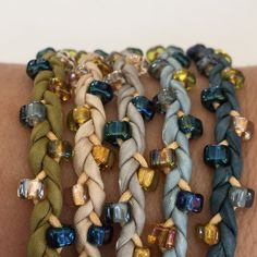 "This is the adult version of the summer friendship bracelet that you made in your youth. You will love the luxury of the silk on your skin, and the shimmer of the glass beads when you wear them. This is my Marsha Neal Studio Blue Gold Boho silk color palette. And I have made a custom bead mix of Miyuki size 5 triangle beads to coordinate. I have picked out 1mm cotton cords and my ceramic disc beads glazed in various colors to give you a palette that works together. I also offer these without my Adult Friendship Bracelets, Boho Palette, Triangle Beads, Braided Wrap Bracelet, Friendship Bracelet Kit, Silk Wrap Bracelets, Diy Friendship Bracelet, Diy Craft Kit, Silk Jewelry