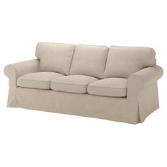 a white couch with two pillows on it's back and one arm folded up