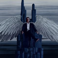 a man sitting on top of a throne with wings