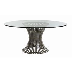 an oval glass table with metal base and round glass top, on a white background