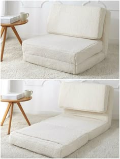 a couch that has been made into a bed and is sitting on the floor next to a table