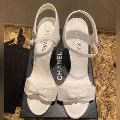 Hello!!! I Hope You Will Love These Shoes As Much As I Did When Purchasing Them! I Have Never Worn This Shoes Other Than For Pictures At My House For About 10 Mins For My Wedding Day!! These Are Brand New Chanel Bow White Sandal Heels!! I Bought These At The Wynn Las Vegas Chanel Boutique! They Are So Special To Me But They Are Too High For Me So I Want To Sell Them! If You Have Any Questions Please Let Me Know!! All Original Packaging Of The Box. These Are Perfect Shoe To Have In Your Collectio Wedding Heels Chanel, White Heels Chanel, Wedding Heels Luxury, White Luxury Heels, Coquette Shoes Aesthetic, Chanel White Heels, Classy White Heels, White Dior Heels, White Chanel Shoes