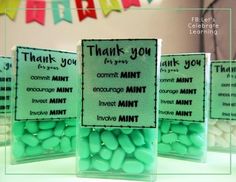 there are many mints in small plastic containers with thank you notes on them for someone's birthday