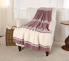 a chair with a blanket on top of it