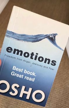 someone is holding up a book with the caption's title, emotions best book great read osho