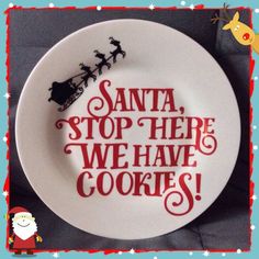 a plate with santa's stop here we have cookies on it