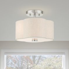 a living room scene with focus on the light fixture