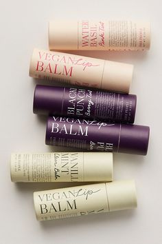 Formulated with a blend of natural butters and oils, this daily, plant-based lip balm nourishes and protects the lips in three juicy flavors. Grapeseed oil and sunflower seed oil nourish and soften; shea butter and cocoa butter condition and protect; and candelilla wax provides a moisturizing, breathable barrier. Packaged in a 100% recyclable FSC paper tube. * 0.35 oz. * Vegan & Cruelty-free * Free of parabens, petroleum and artificial colorants * Made in the USA **Sweet Vanilla Mint Flavor:** C Lip Balm Paper Tube, Natural Skin Care Packaging, Beauty Label Design, Shea Butter Aesthetic, Lip Balm Packaging Ideas, Makeup Packaging Ideas, Blackberry Punch, Lip Balm Design, Lip Balm Tube Packaging