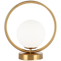 a white ball sitting on top of a metal stand with a gold ring around it