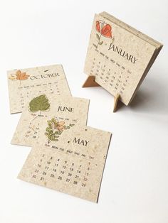 three calendars sitting on top of each other