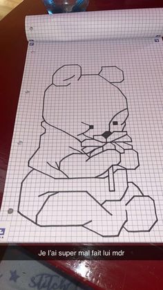 a paper with a drawing of a bear on it