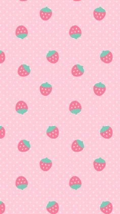 a pink background with strawberrys and polka dots