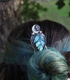 Moonlight- Hairpin Lovely blue green hand carved labradorite with moon, twinkling details. The pins are 6 inches long, total length of the pin for hair use is 5.5 inches in length. This pin is great for thick hair. Every hair type is different and require the right touch, yours, to fit it in perfectly. This is a one of a kind sterling silver pin. It has been work hardened to be sturdy and stiff but with wear can bend like holding chopsticks when finding the right configuration for your hair. Sim Holding Chopsticks, Instagram Message, Sensory Friendly, Metalsmithing Jewelry, Crystal Hair Pins, Star Hair, Green Hand, Silver Pin, Hair Pin