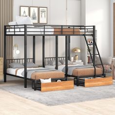 a bunk bed with two sets of beds underneath it in a room that has hardwood floors and white walls