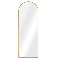 an arch shaped mirror with gold trimmings on the bottom and sides, against a white background