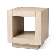 a small wooden cube with one section cut out