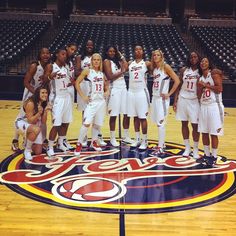 the women's basketball team is posing for a photo