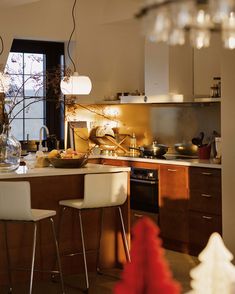 the kitchen is clean and ready to be used for dinner or other entertaining purposes in someone's home