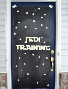 a door with the words jed training painted on it and stars in the background