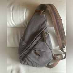 Unisex M/W Canvas Backpack/Shoulder Bag ,Nice Gray Color ,Very Comfortable For Using. L9.5”. Never Used Gray Canvas Shoulder Bag For School, Gray Shoulder Bag For School, Gray Crossbody Shoulder Bag For School, Casual Gray Chest Bag With Adjustable Strap, Gray Canvas Shoulder Bag With Adjustable Strap, Gray Canvas Bag With Adjustable Strap For Daily Use, Large Capacity Gray Backpack Shoulder Bag, Gray Travel Chest Bag With Zipper Pocket, Gray Travel Chest Bag With Adjustable Strap