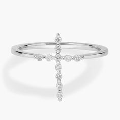 Let your faith shine as you wear this delicate ring featuring a slender cross design in gorgeously gleaming 14k white gold. Delicate diamonds shimmer along the arms of the cross, adding breathtaking beauty. Diamond Fashion Rings, Breathtaking Beauty, Diamond Cross, Cross Design, Fashion Ring, Blue Nile, Cross Designs, Delicate Rings, The Cross