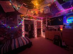 a bedroom decorated with colorful lights and decorations