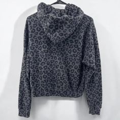 Stay both stylish and comfortable in this versatile Fierce Leopard Print Hoodie, ideal for everyday casual wear. The sophisticated animal print design adds a touch of fierce elegance to any wardrobe, guaranteeing effortless style. Features: Made from soft, fabric that provides comfort throughout the day. Features a perfect fit with ribbed cuffs and hem for added flexibility. Equipped with a spacious front pocket for convenience and practicality. Leopard print design adds a touch of wildness to y Leopard Print Hoodie, Leopard Hoodie, Comfy Blouse, Sweater Socks, Animal Print Pattern, Warm Pants, Animal Prints Pattern, Sleeveless Short Dress, Cozy Hoodie