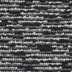 black and white textured fabric with small dots