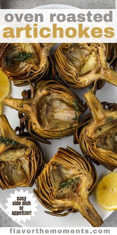 artichokes on a white plate with lemon wedges and herbs in the middle