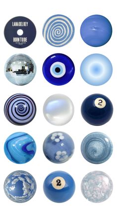 several different types of marbles are shown in this image, including blue and white