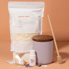 the contents of a natural skin care product on a pink background