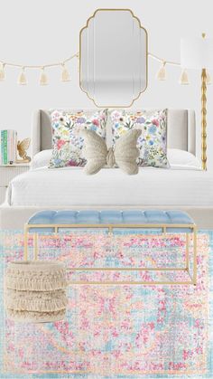 a white bed sitting next to a colorful rug and a mirror on top of it